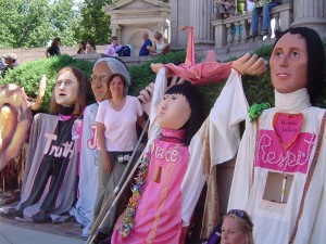 CodePink Taos is bringing these 5 Giant Puppets to the Parade … and looking for 5 strong backs to wear them!